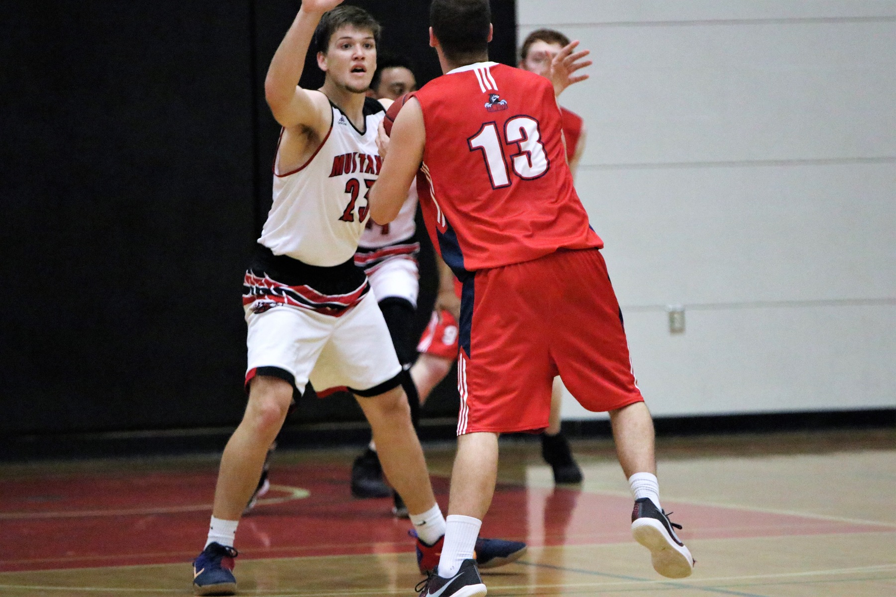 Mustangs Sneak by Fighting Saints 79-73