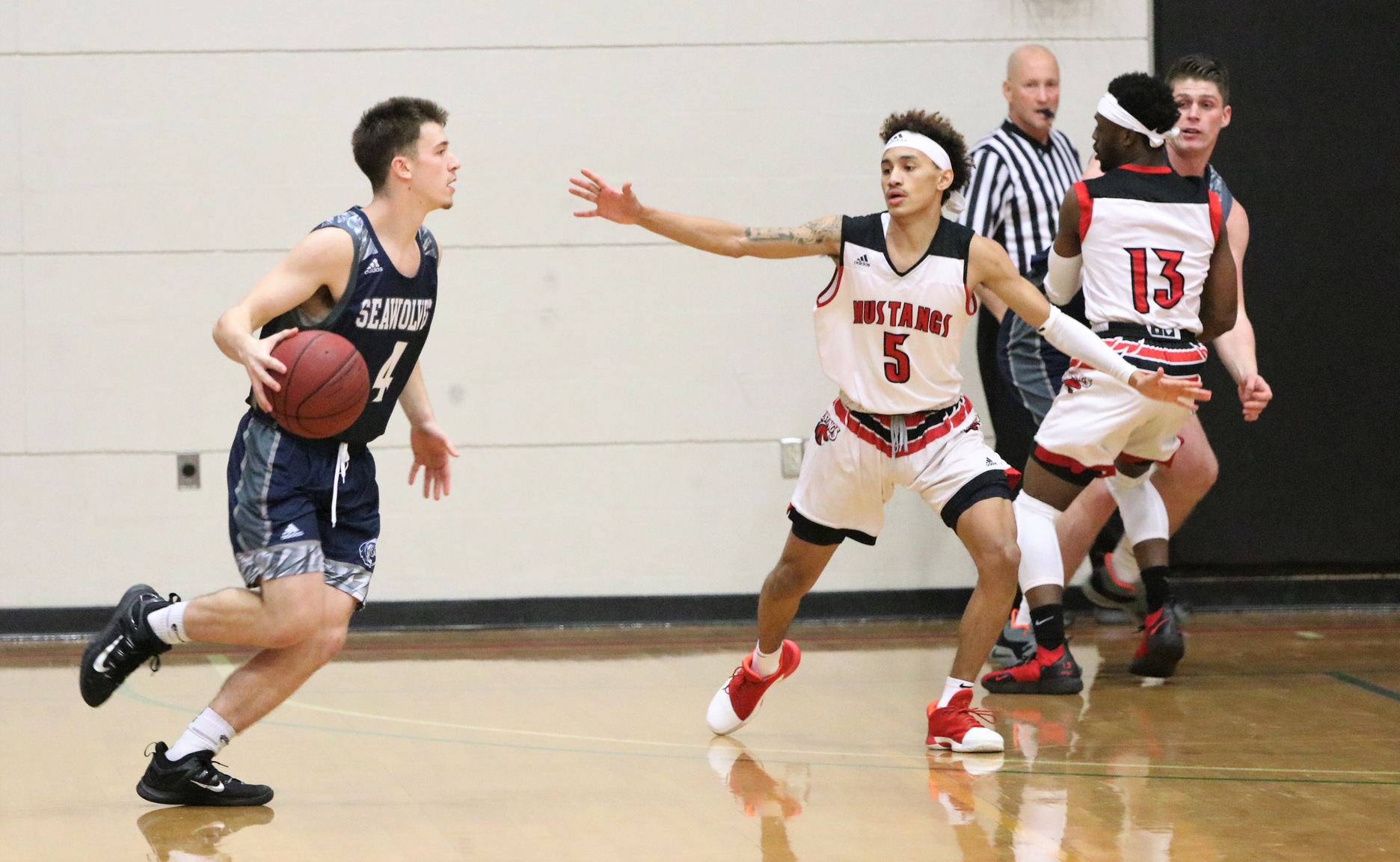 Knights Slip by Mustangs 75-72