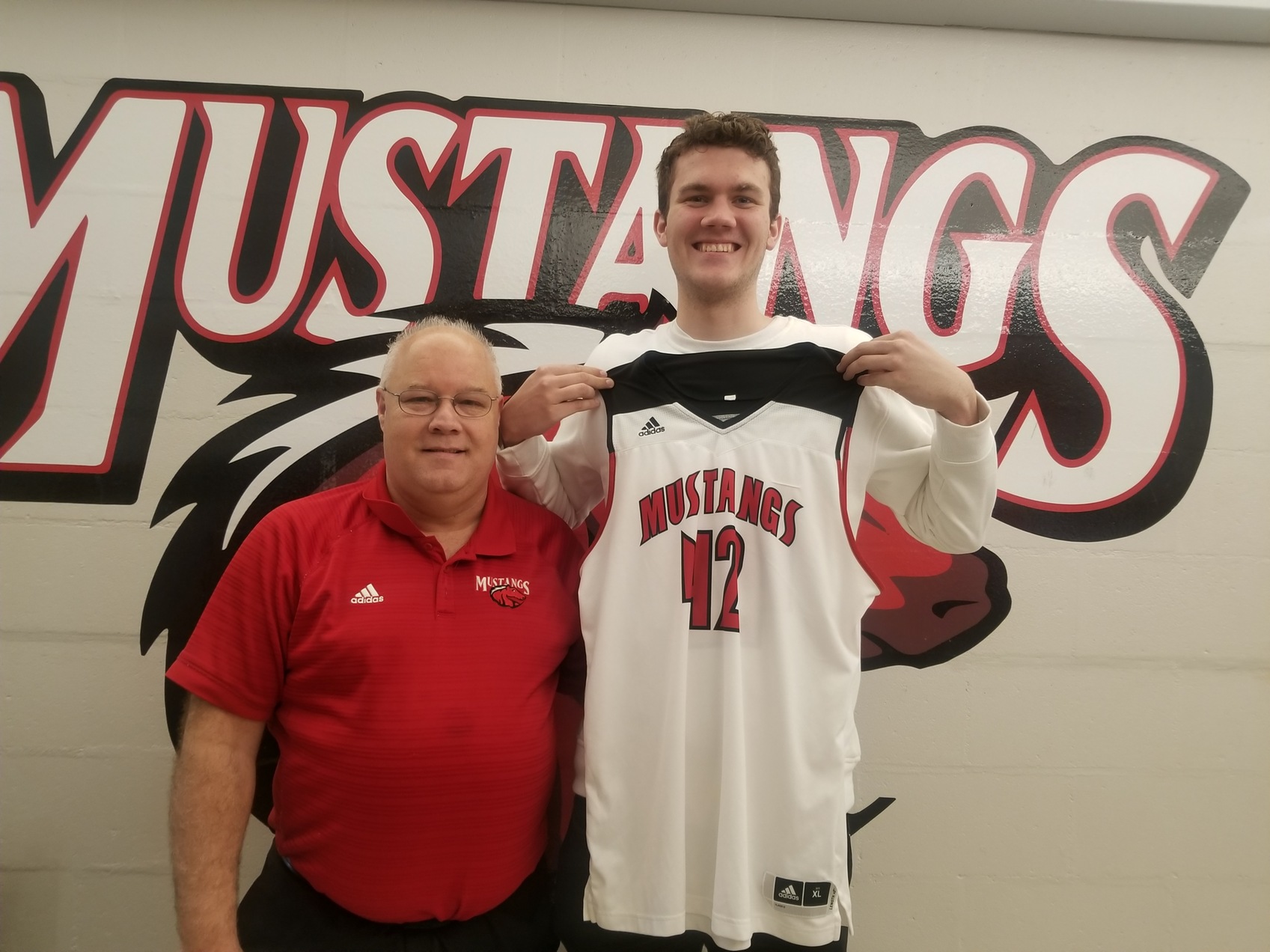 Mustangs Land Big Man