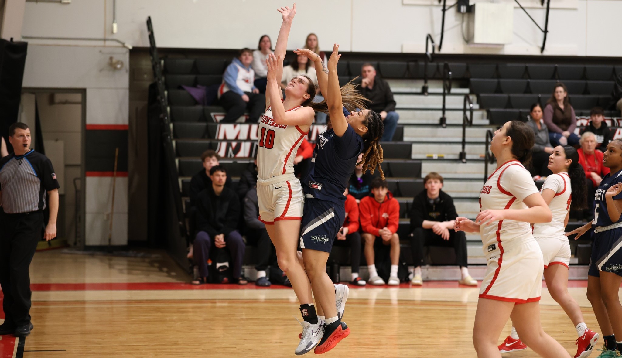 Mustangs Scrap Past Warriors in Second Half for Win